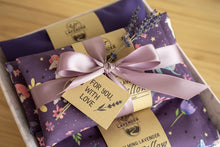 Load image into Gallery viewer, A set of lavender eye pillows with removable cases, featuring purple fabric with unicorn and stars design, and labeled as 'Calming Lavender Eye Pillow'.
