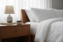 Load image into Gallery viewer, Lavender Moisturizing Balm on a night stand