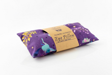 Load image into Gallery viewer, Purple eye pillow with a brown label on a white surface