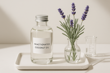 Load image into Gallery viewer, ingredient highlight: fractionated coconut oil and English lavender on display
